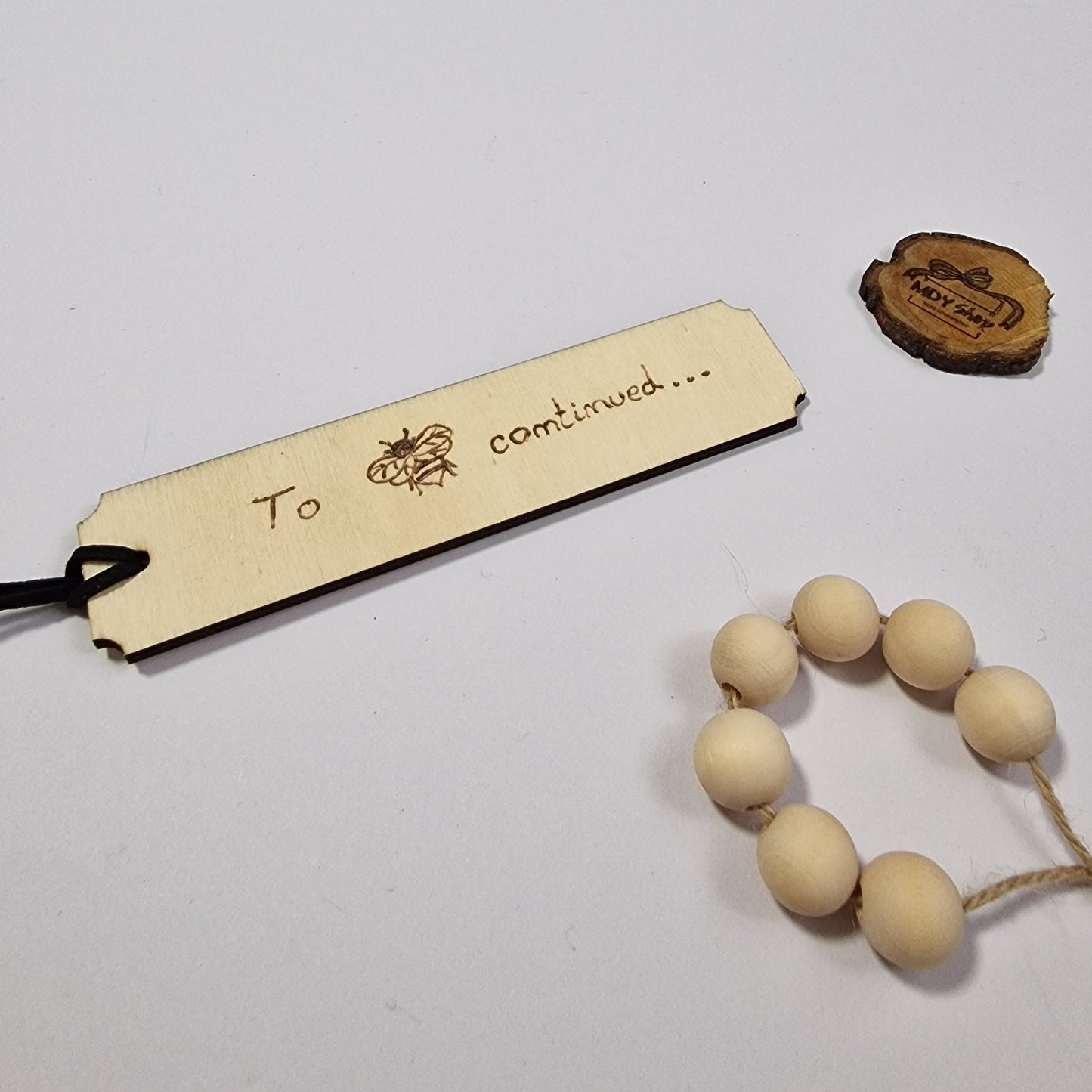 Semn de carte gravat manual - ”To be(e) continued”